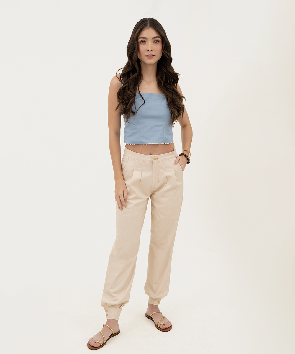 Pantalón ancho pliegues y puños Beige