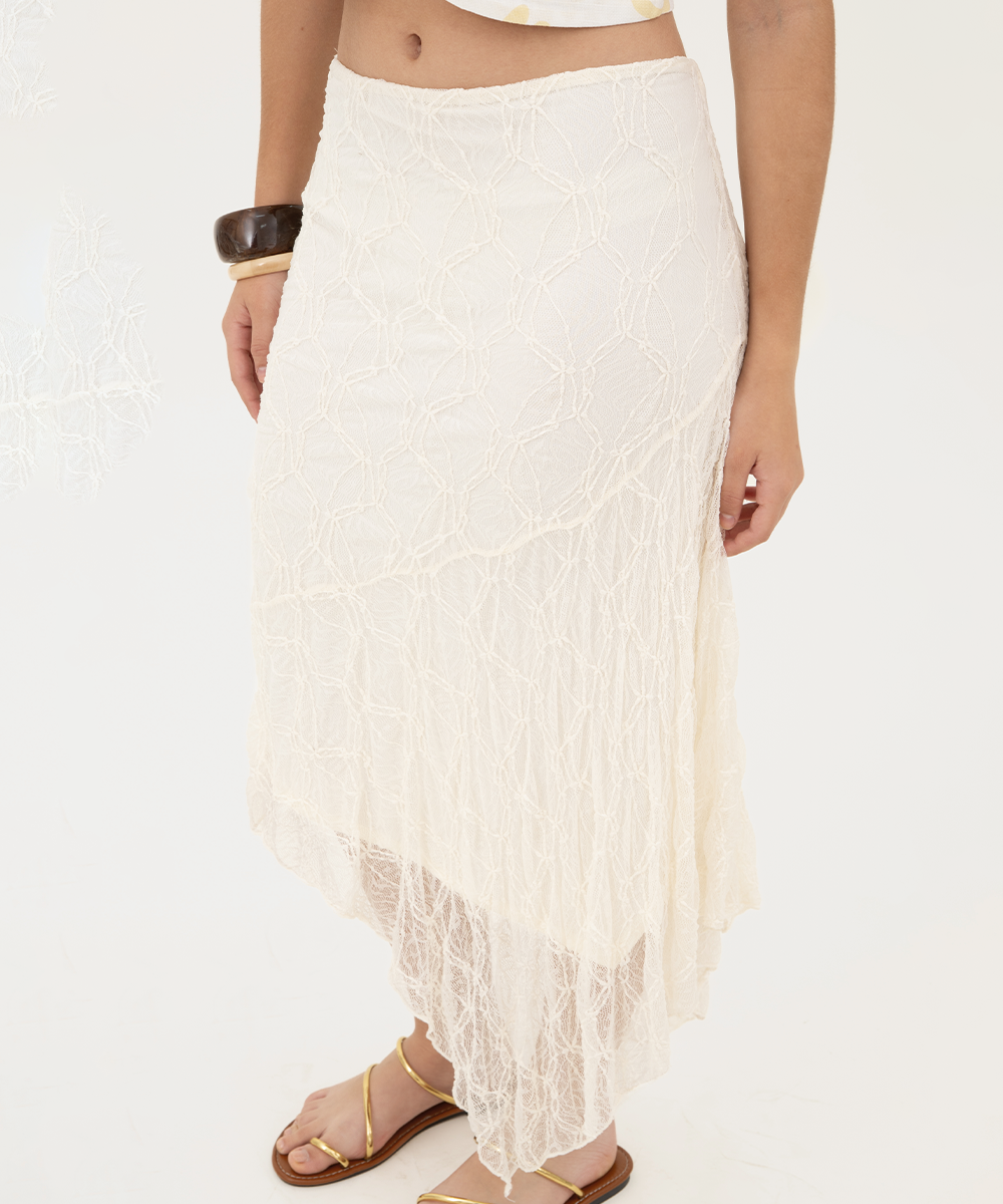 Falda asimétrica blonda Marfil
